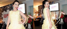 Kim Hiền tự tin diễn thời trang với váy bao cao su