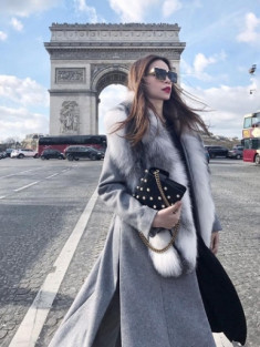  Hồ Ngọc Hà khoác áo choàng lông trên đường phố Paris 