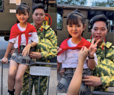 “Con gái Tăng Duy Tân” đi cổ vũ concert quốc gia, mắt to môi đỏ “nổi bần bật” trên tay chiến sĩ diễu binh A80